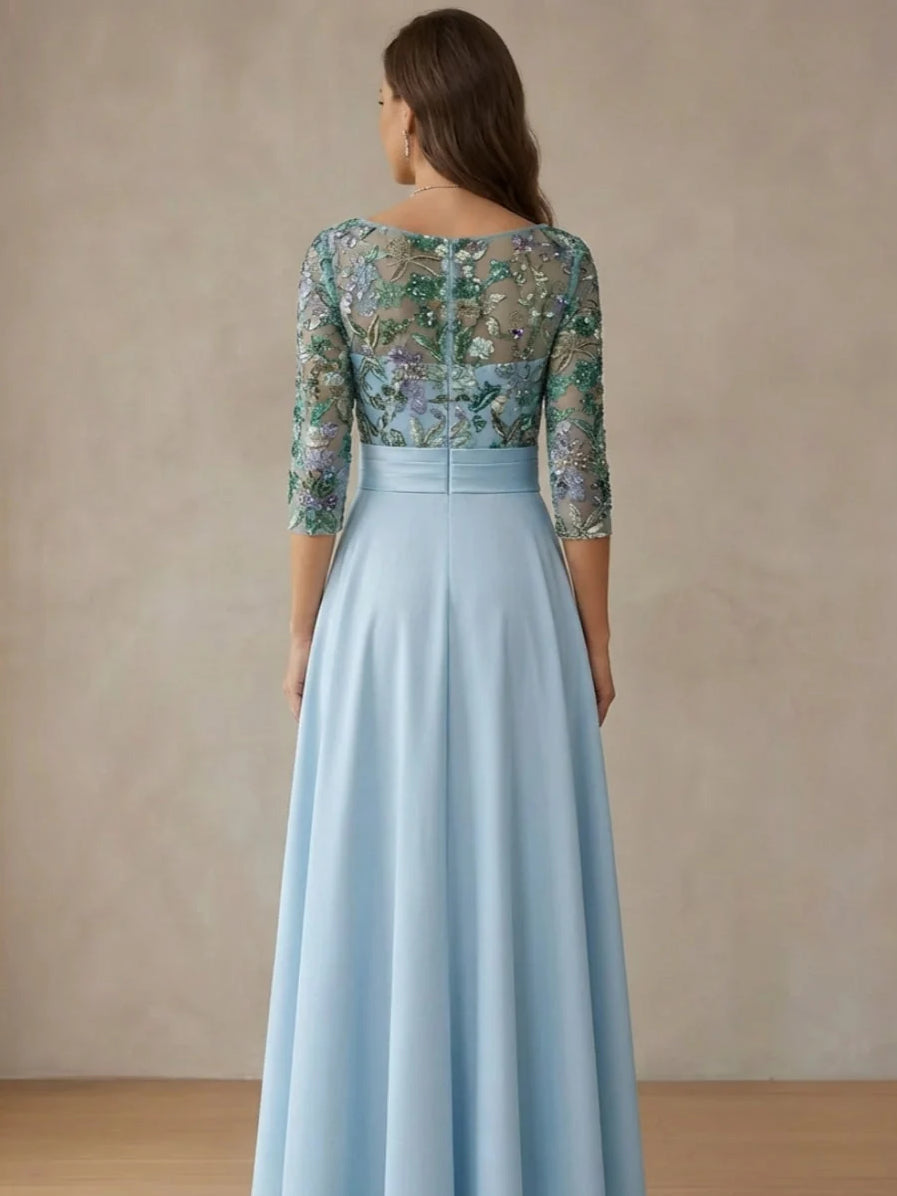 Back view of sky blue satin A-line midi dress with cowl neck and beaded floral embroidery