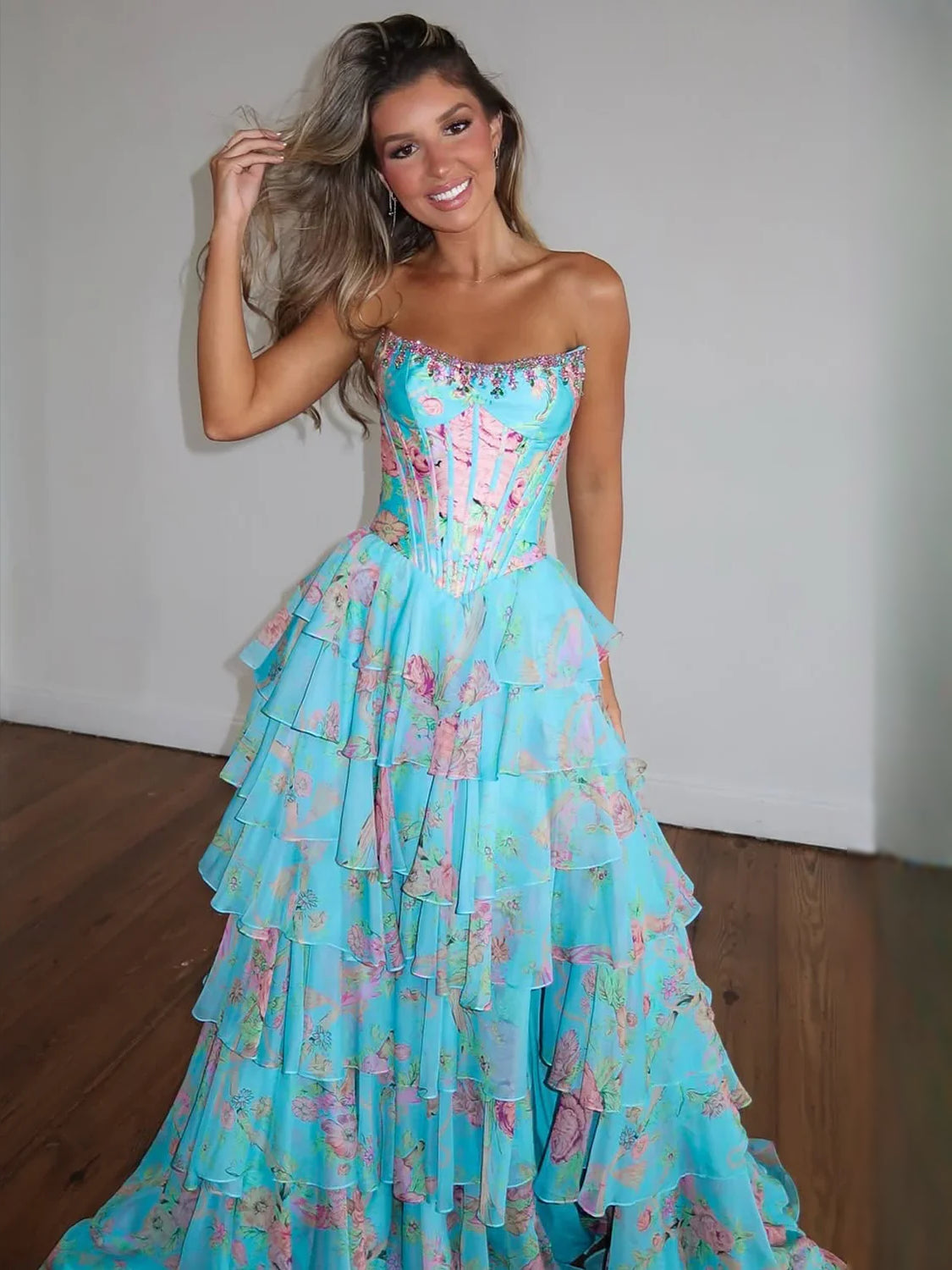 Aqua strapless corset prom dress with pink-blue floral tiered skirt