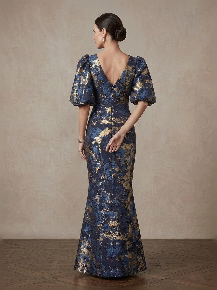 Navy blue mermaid gown with gold floral print, V-back, short puff sleeves, floor length