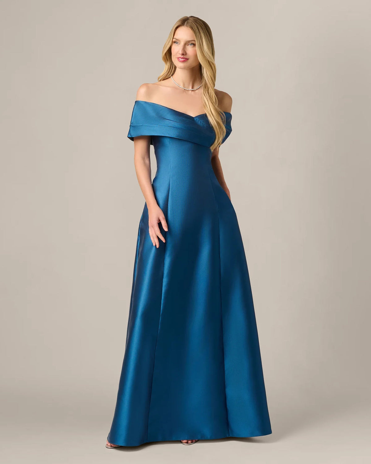 Teal blue off-shoulder A-line maxi gown with fitted waist and flowing skirt