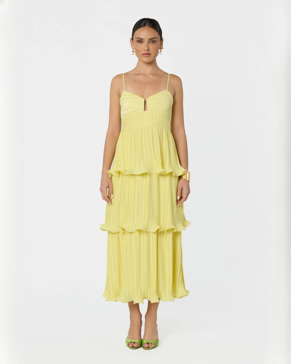 Light yellow sleeveless tiered midi-maxi dress with V-neck and pleated layered skirt