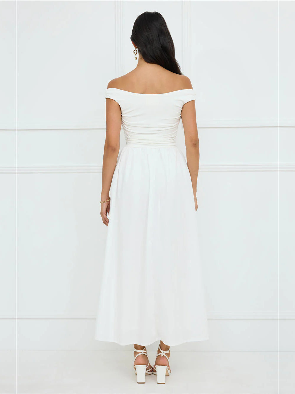 White a-line maxi formal dress with a-line, full-length back view