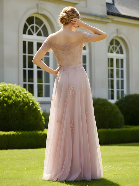 Back view dusty rose off-shoulder A-line tulle dress with embroidered straps and waist