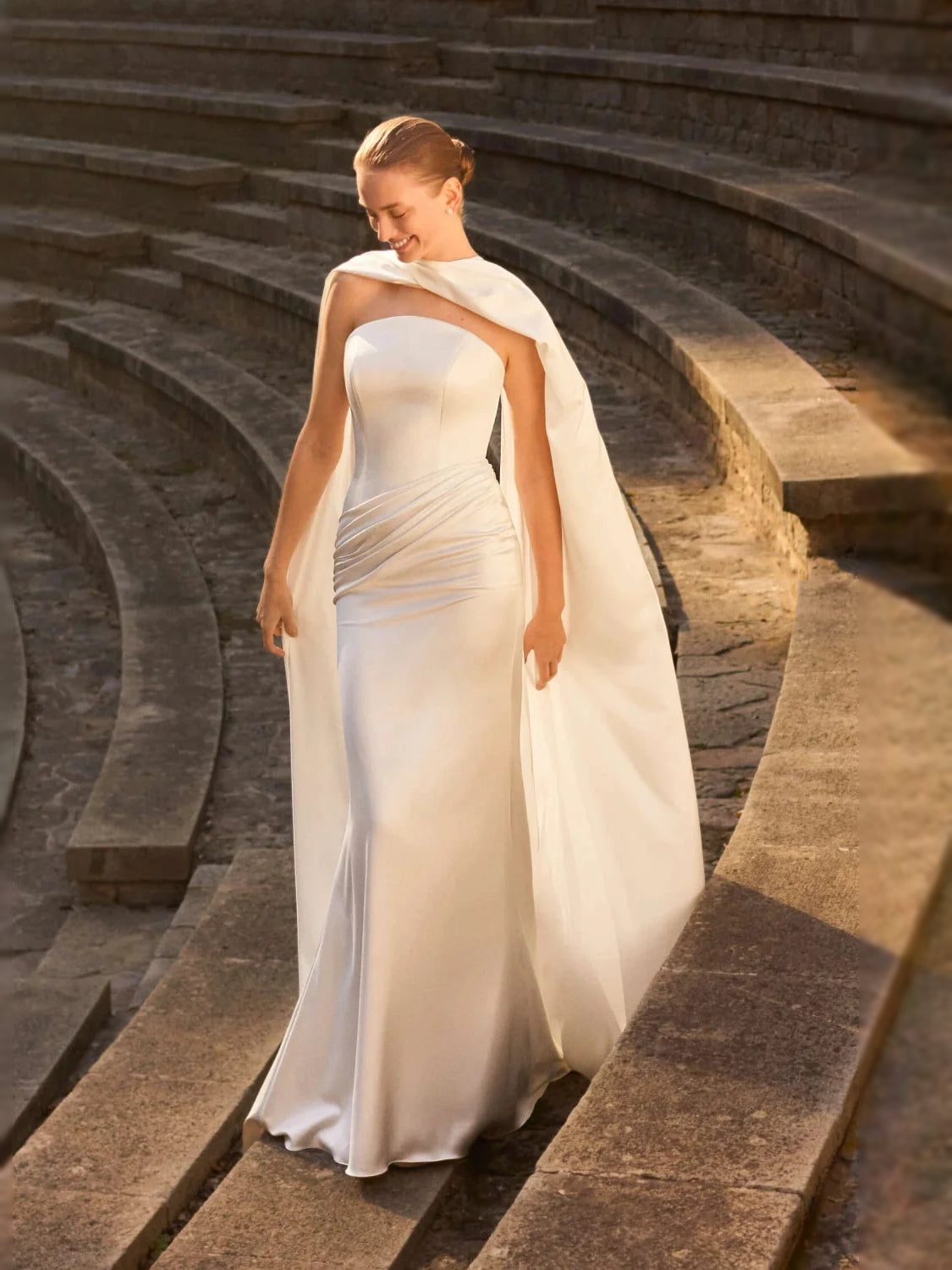 Ivory satin mermaid wedding dress with draped corset, open back, floor-length skirt