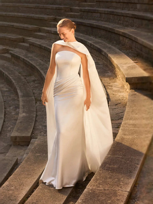 Ivory satin mermaid wedding dress with draped corset, open back, floor-length skirt