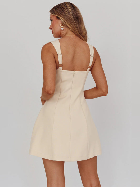 Back view of apricot A-line mini dress with square back and thin straps