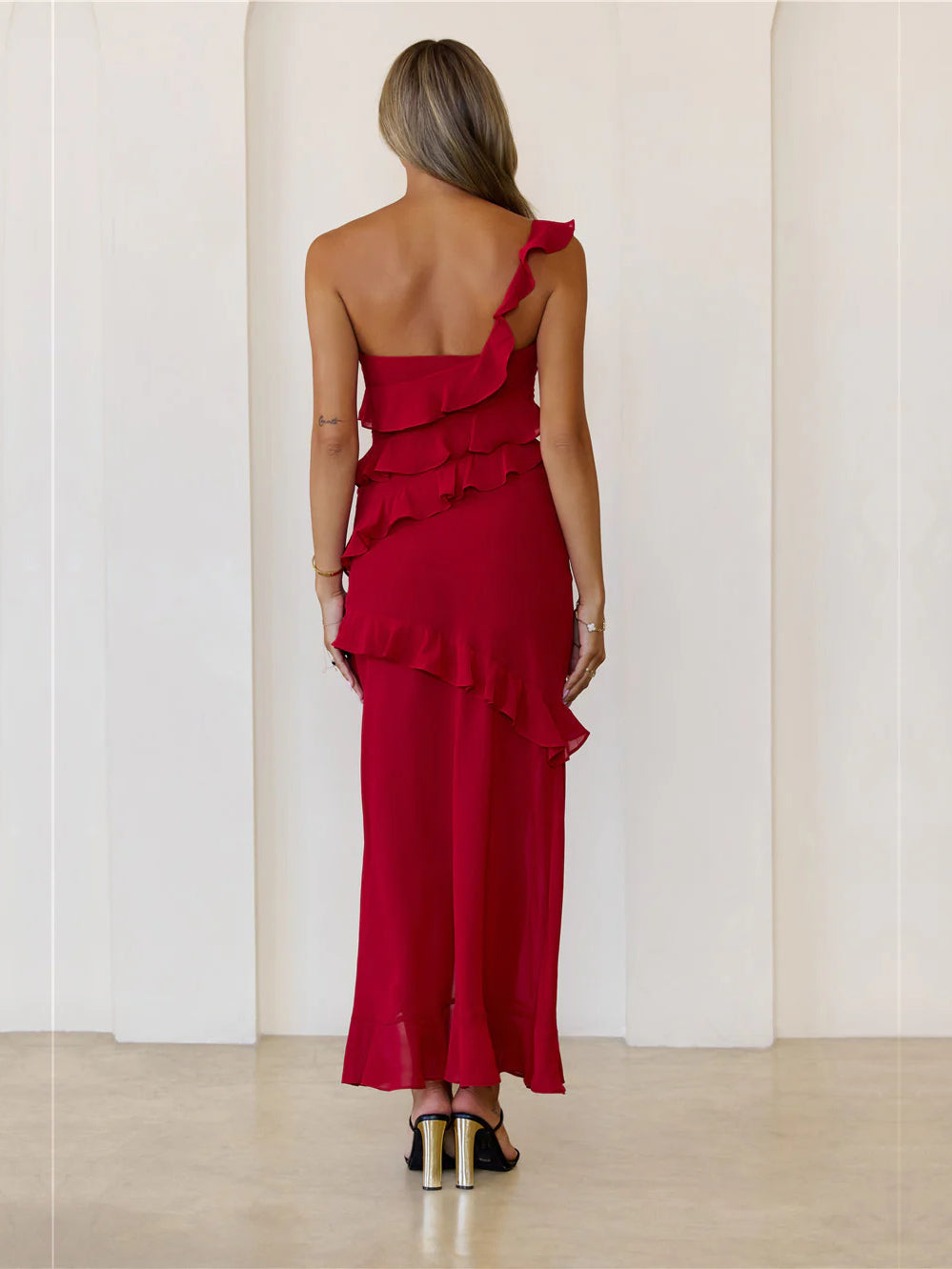 Red sheath maxi formal dress with ruffle details, full-length back view