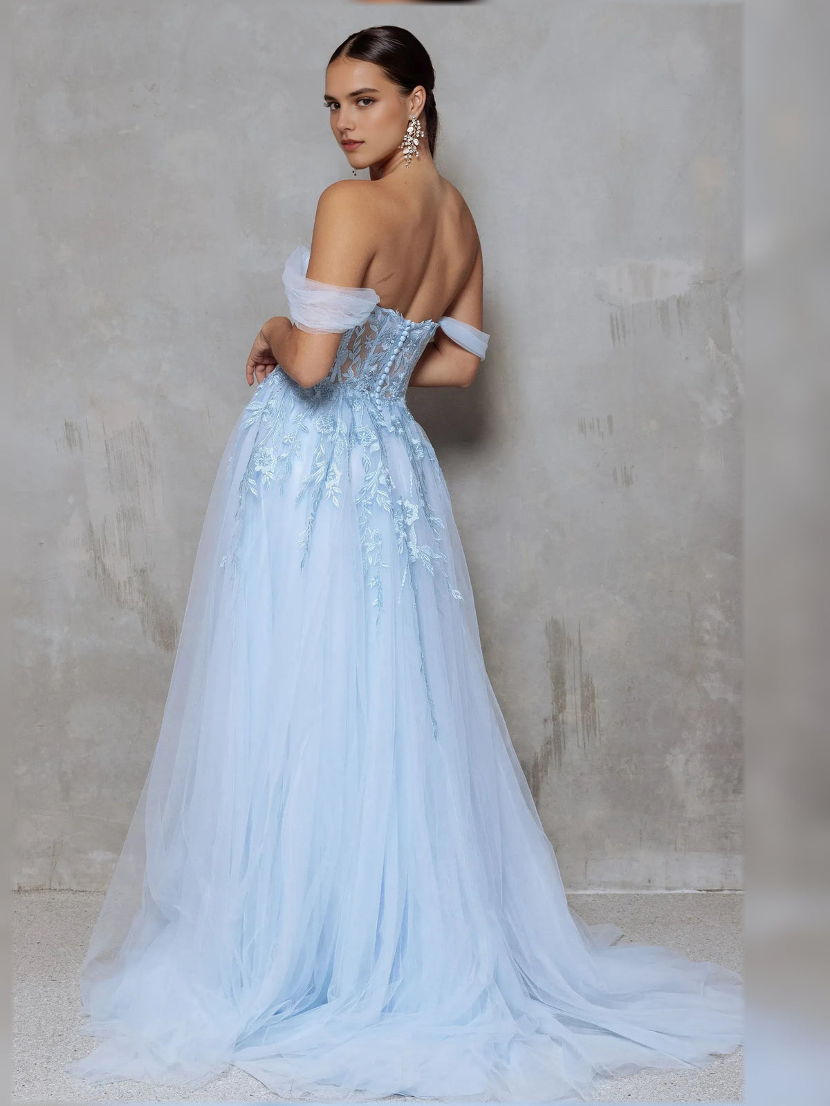 Sky blue floral off-the-shoulder maxi dress with short sleeves, open back, flowing skirt