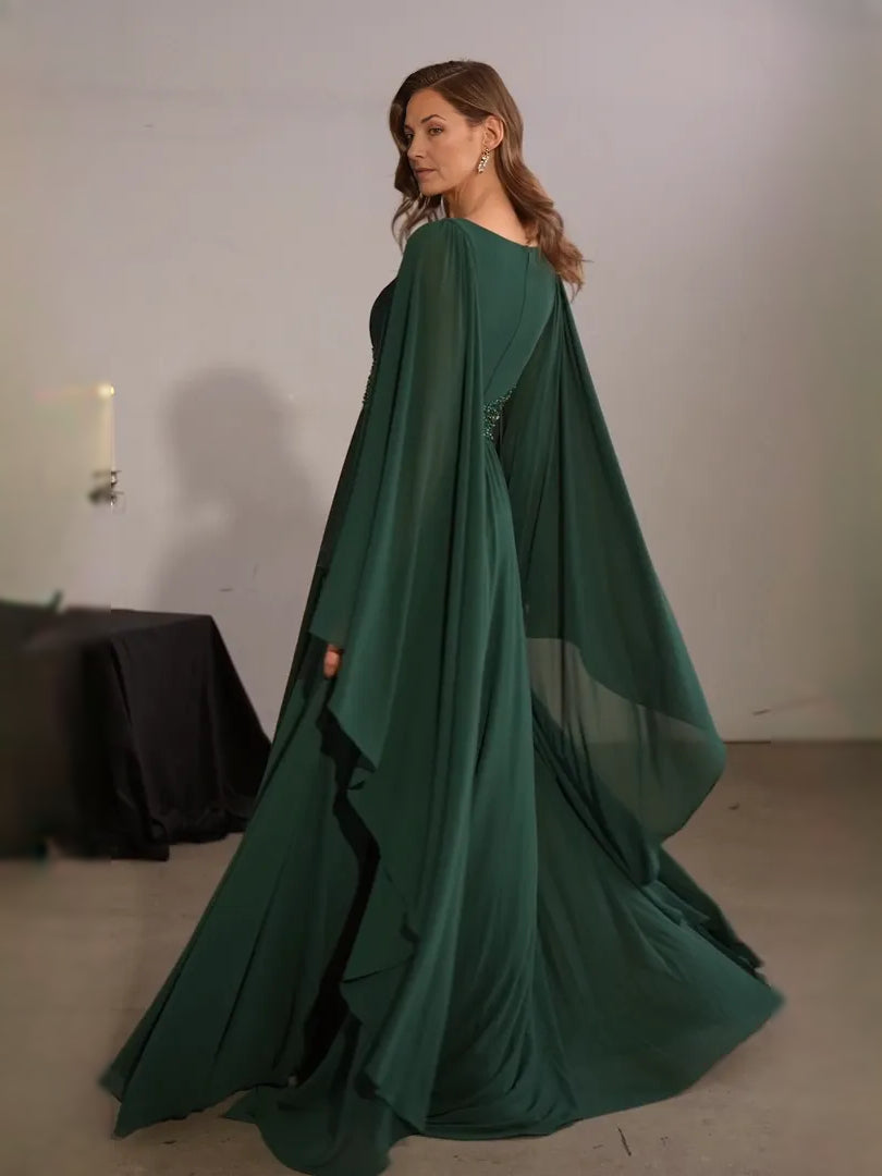 Dark green chiffon V-neck A-line floor dress with flowing cape sleeves and draped back