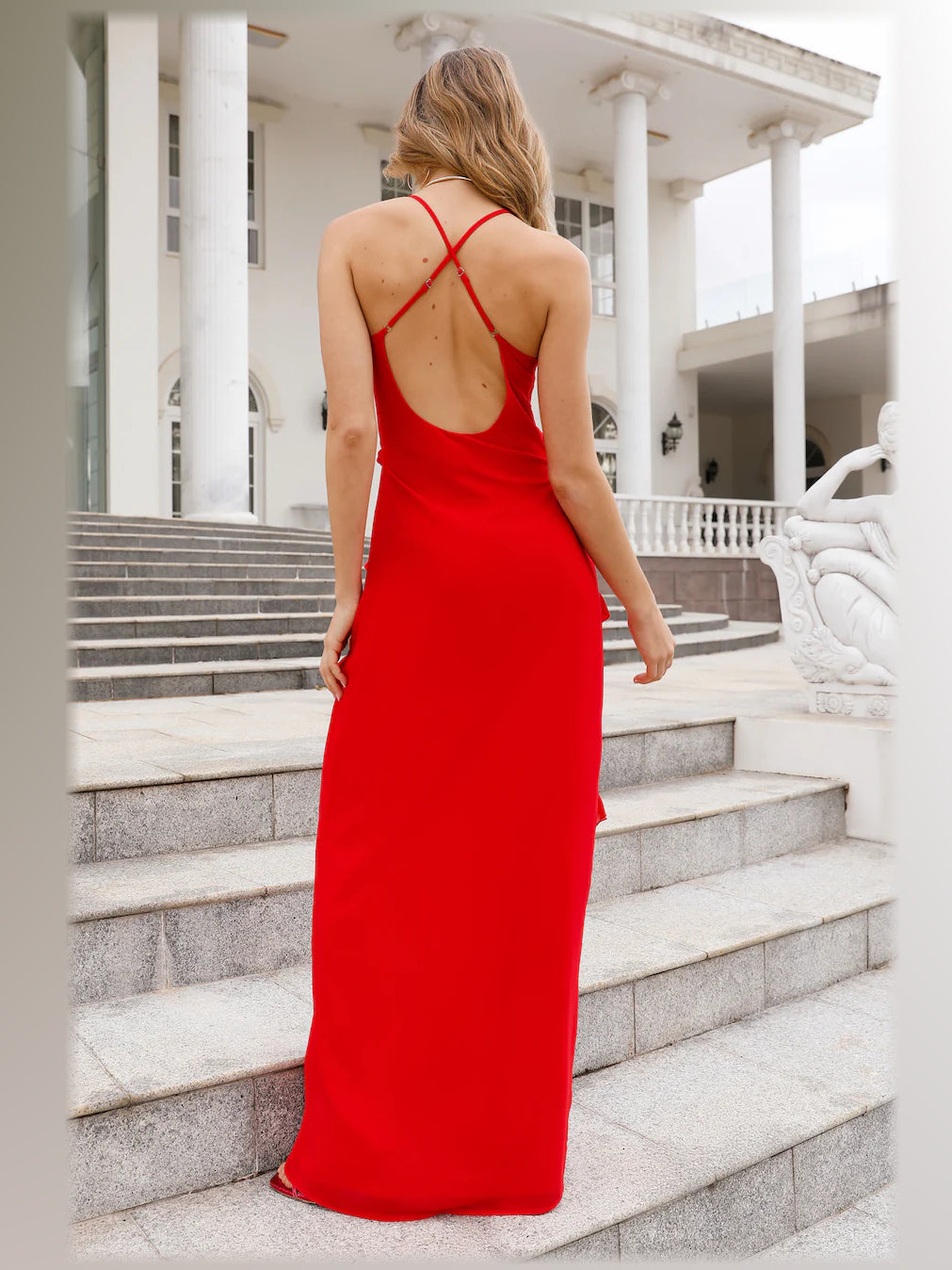Red maxi formal dress, back full-length view showing the bodice