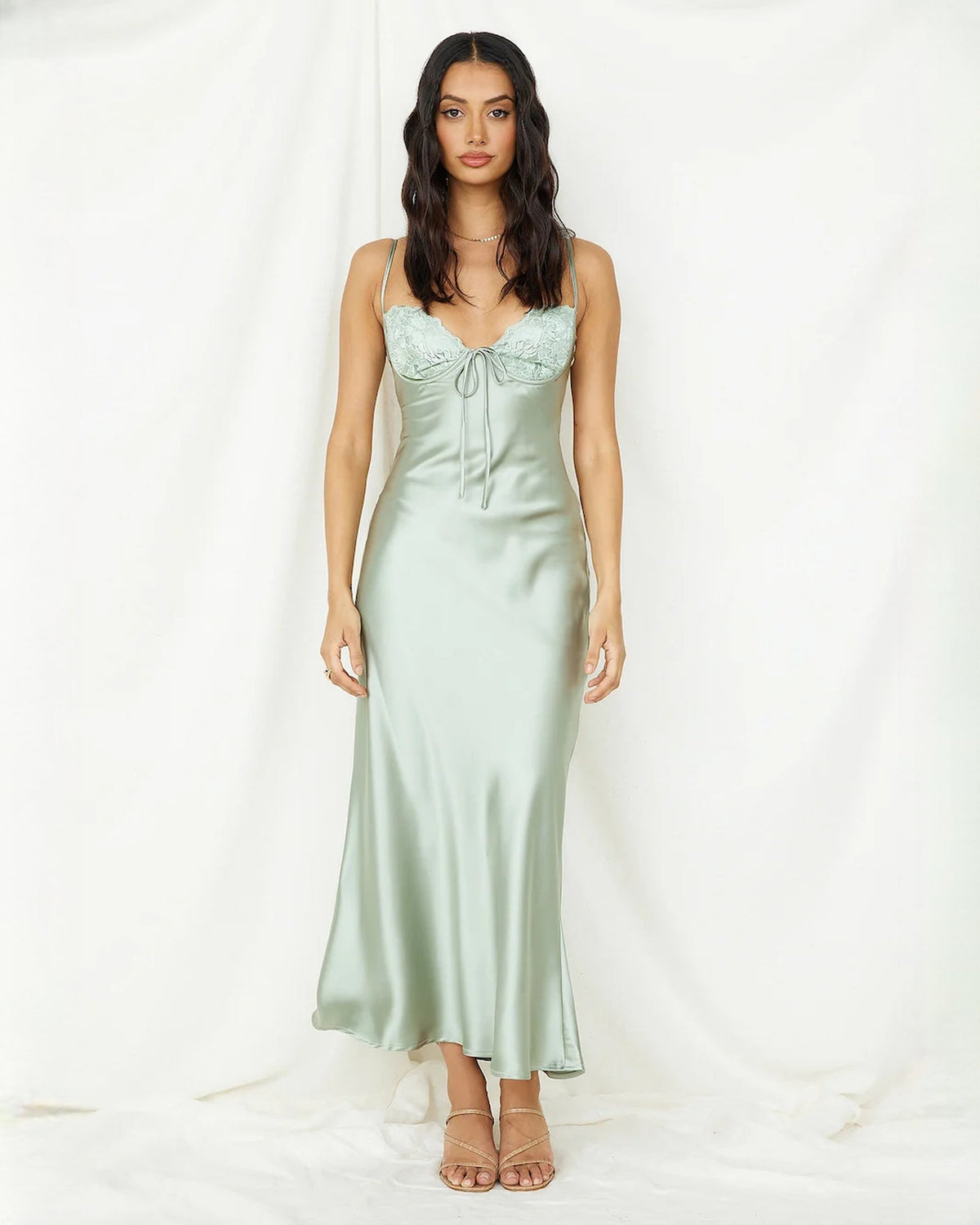 Mint green satin midi dress with scalloped lace bust, spaghetti straps, center tie detail