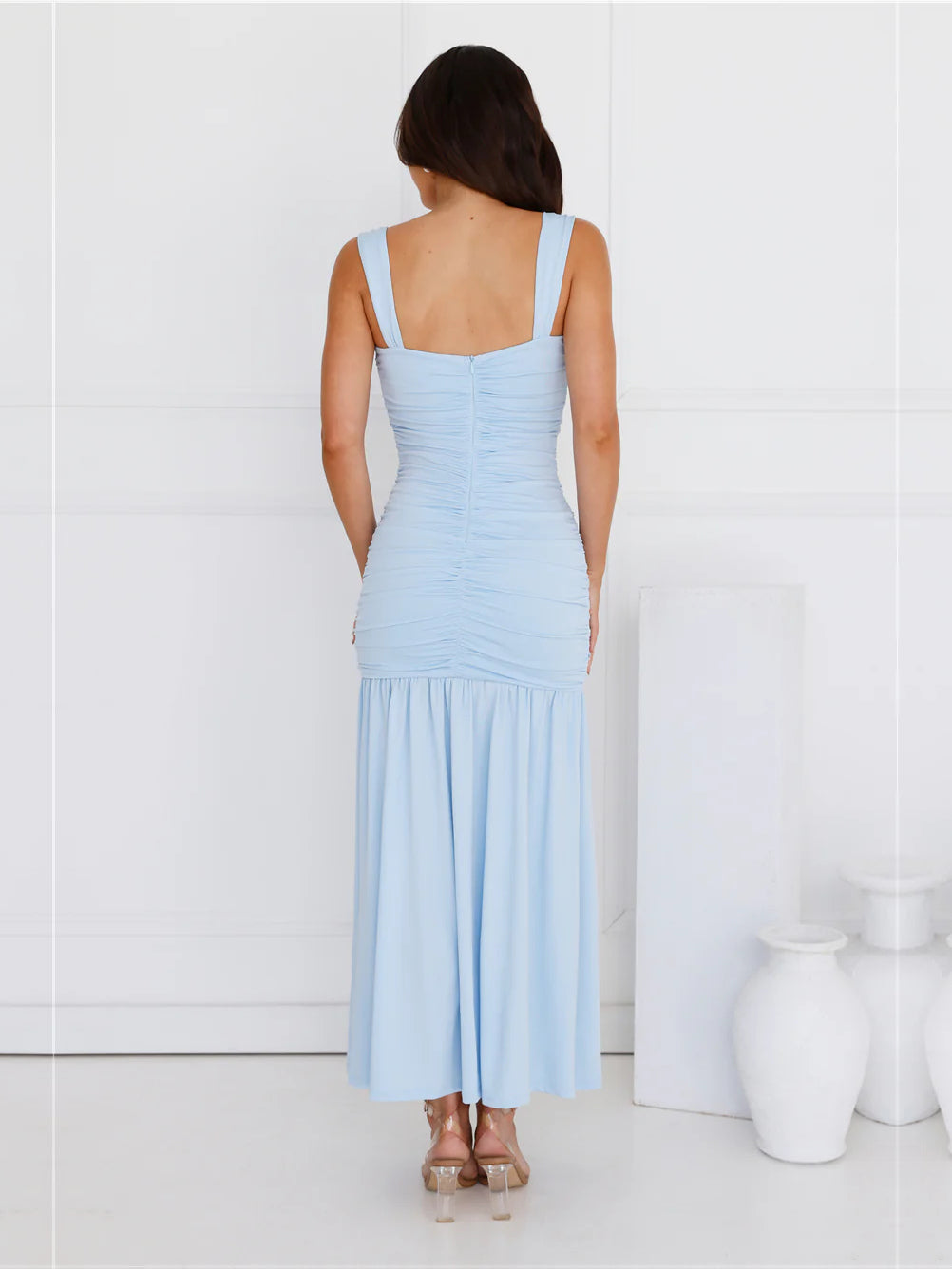 Blue sheath maxi formal dress with ruching, full-length back view