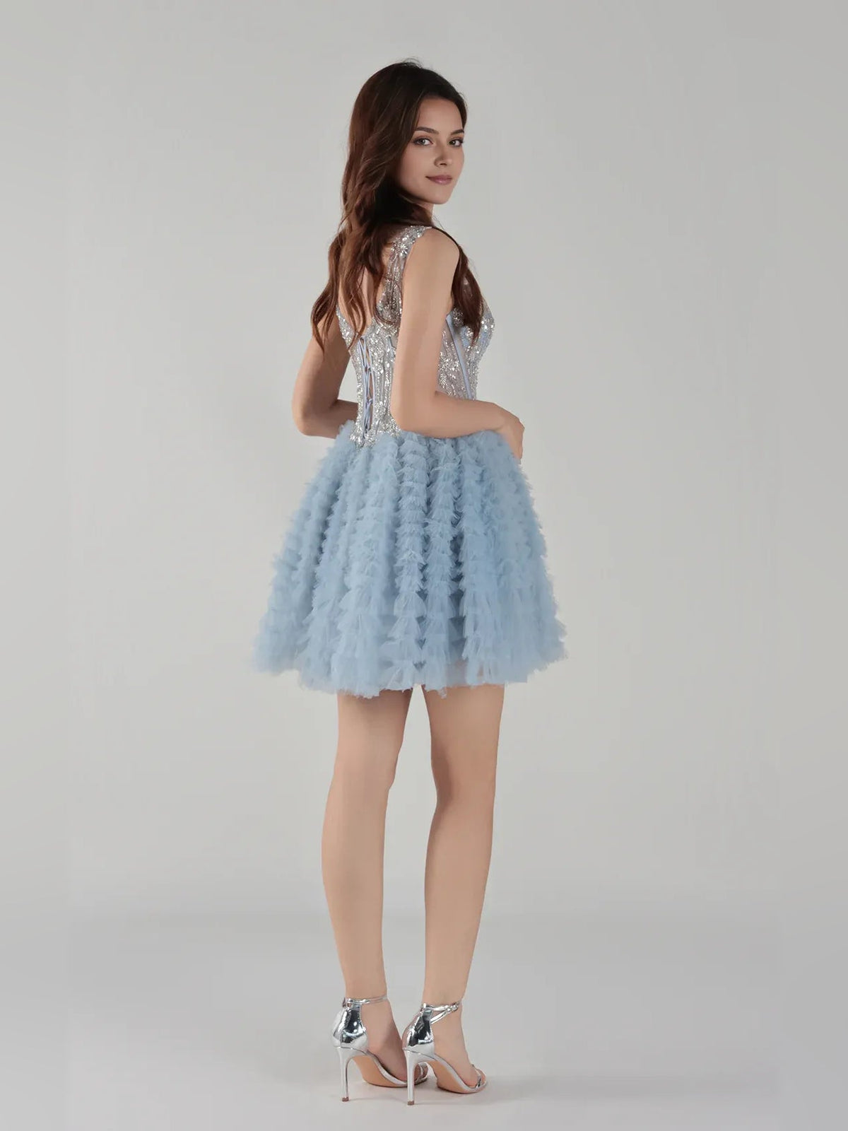 Dusty blue sleeveless mini tulle dress, glitter corset bodice with layered ruffled skirt