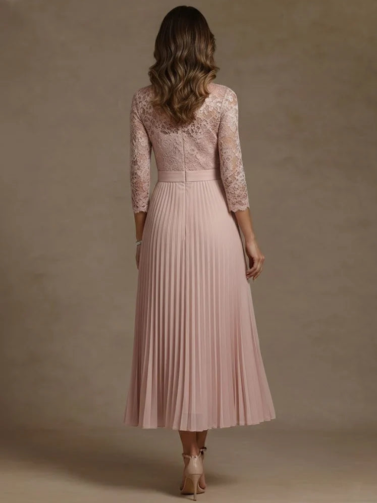 Light pink pleated high-neck chiffon dress with lace long sleeves, back view