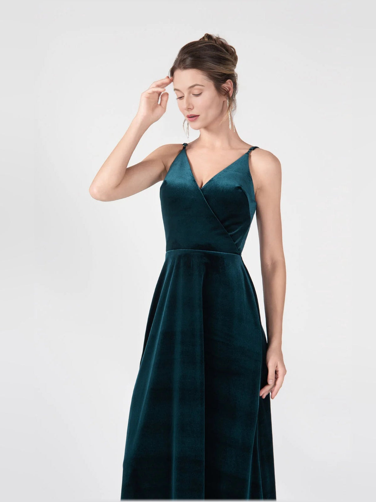 Dark green sleeveless A-line formal dress with V-neck bodice, floor-length