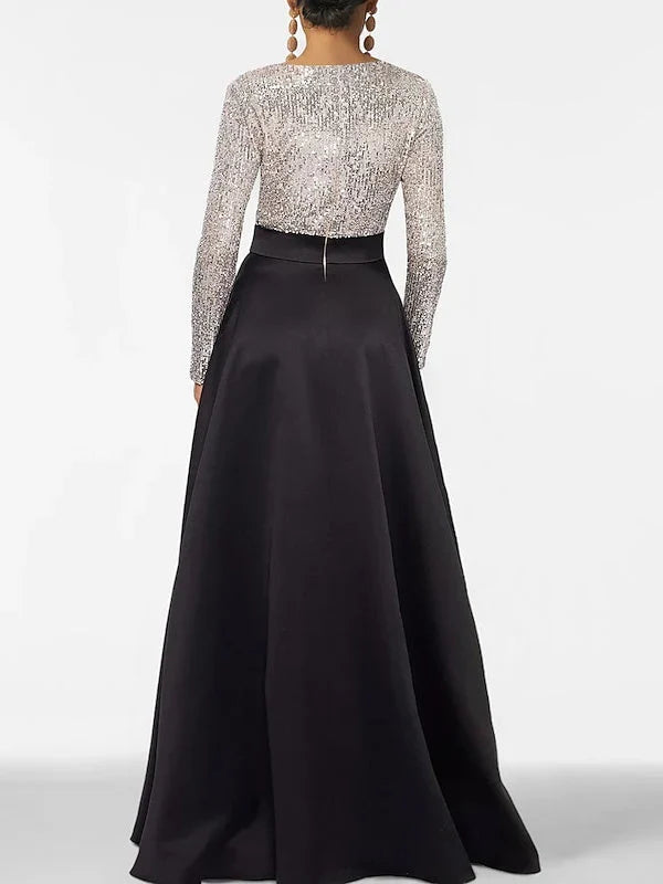 Back view formal dress with silver sequin V-neck and black satin full-length skirt