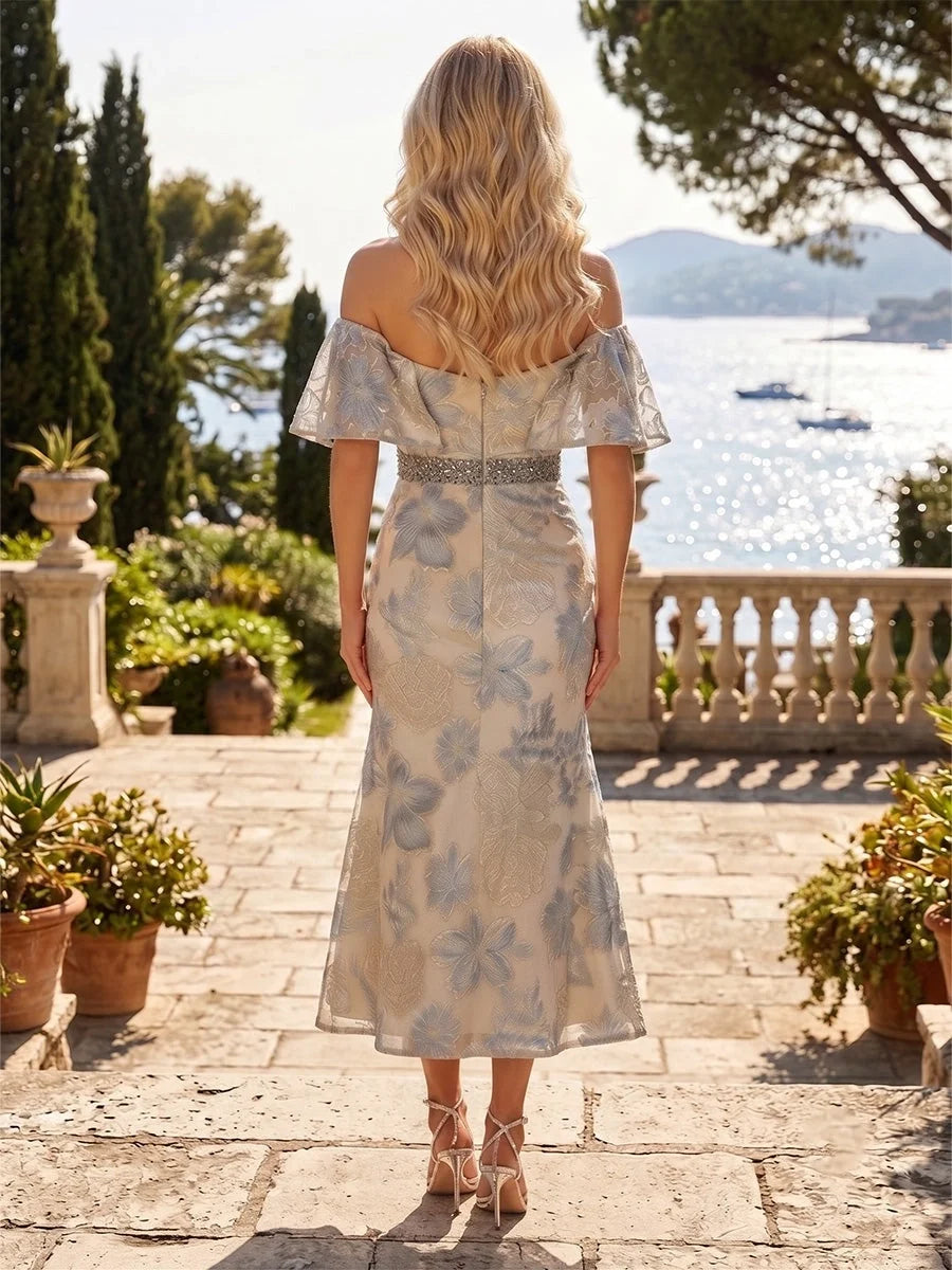 Light blue floral midi dress with off-shoulder ruffle sleeves, back view