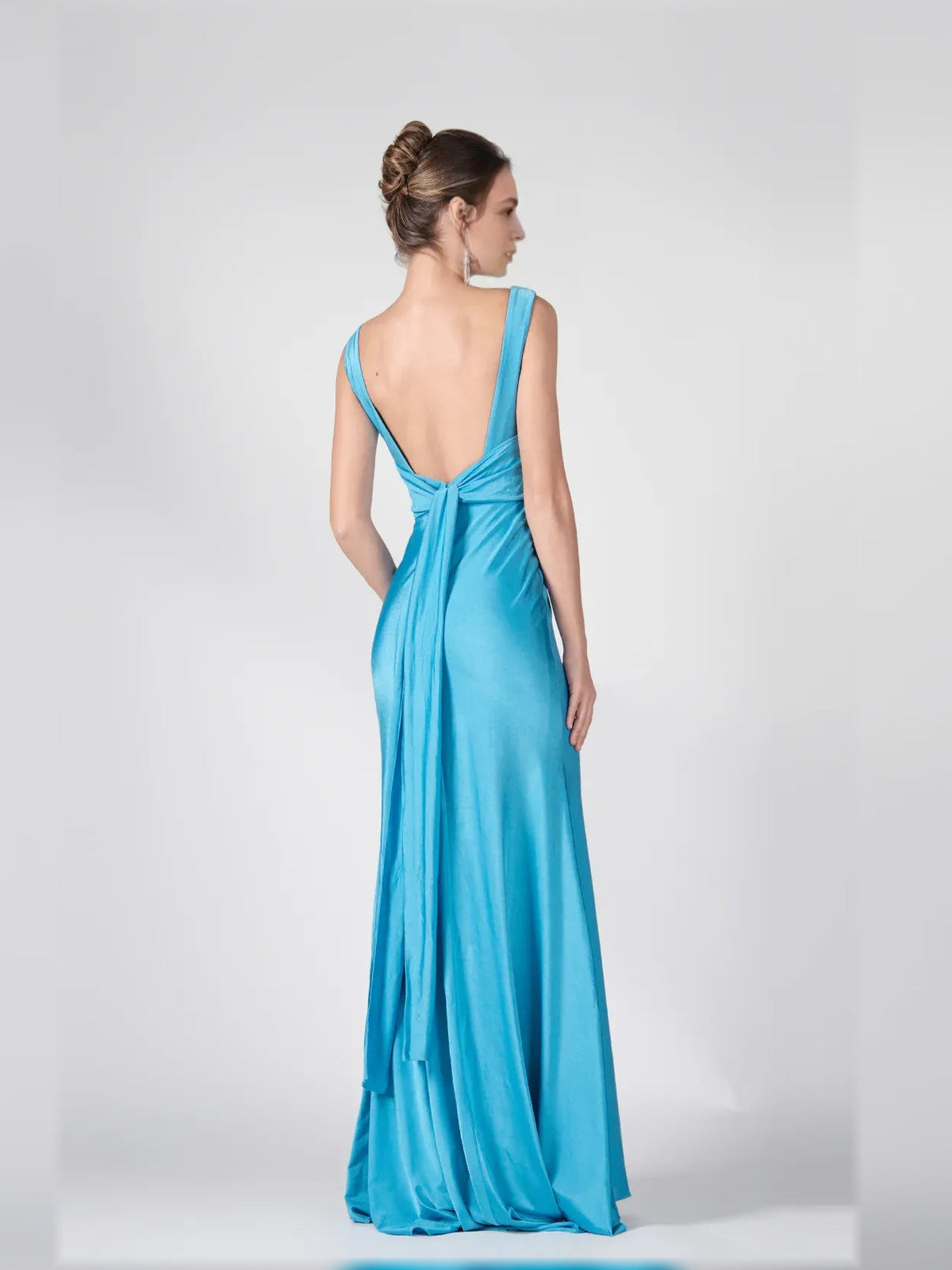 Caribbean blue open-back mermaid formal dress with V-neck and slim shoulder straps