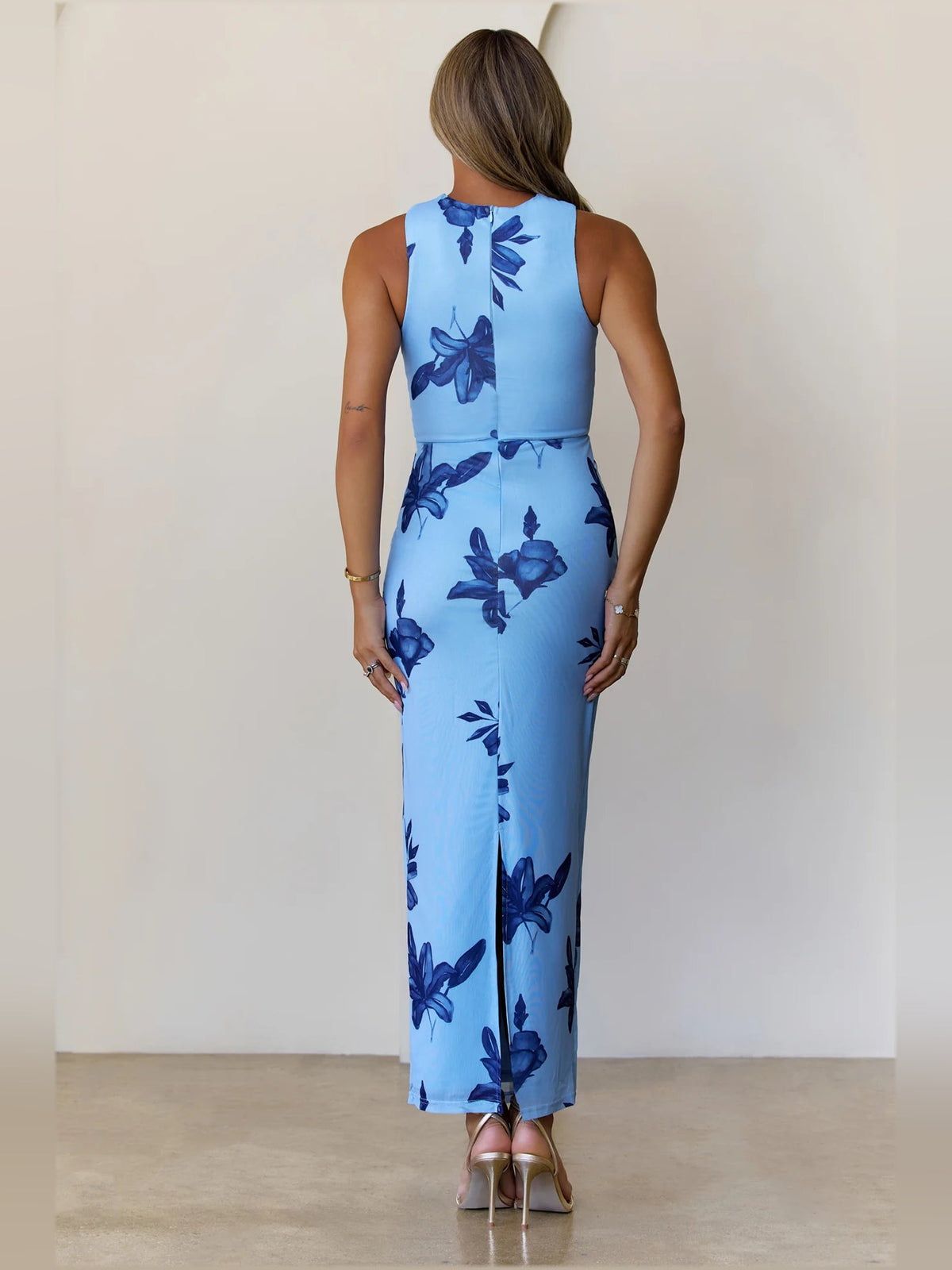 Blue sheath maxi formal dress with floral print, full-length back view