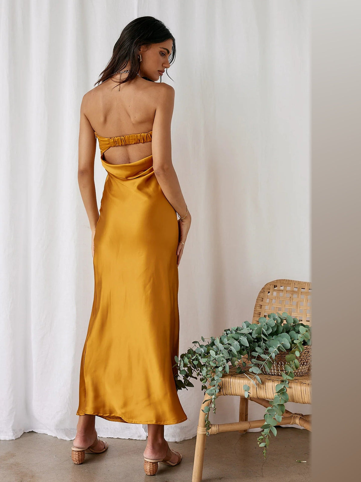 Yellow midi formal dress, back full-length view showing the bodice