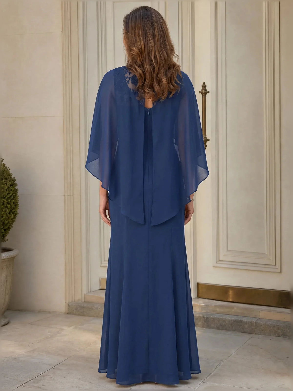 Mermaid floor-length chiffon dress from back, draped cape sleeves, layered bodice