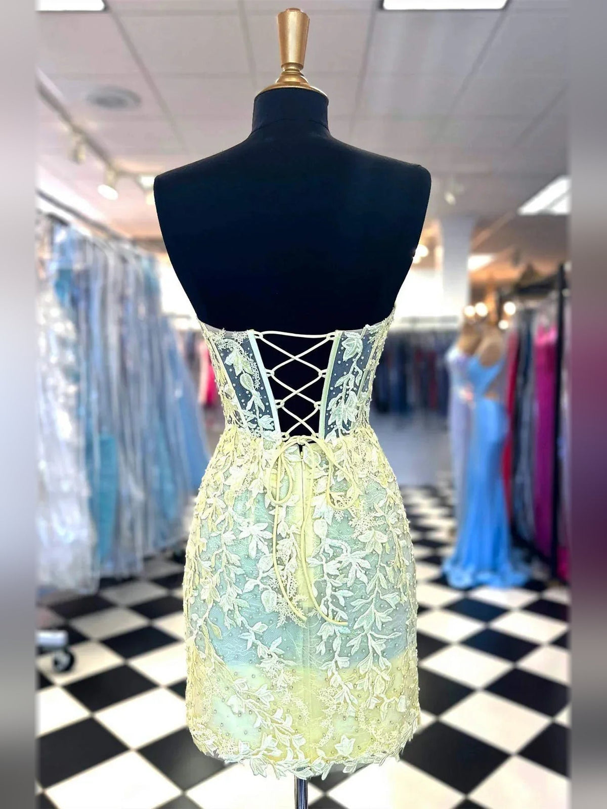 Lemon mini corset dress with lace floral applique and crisscross back detail