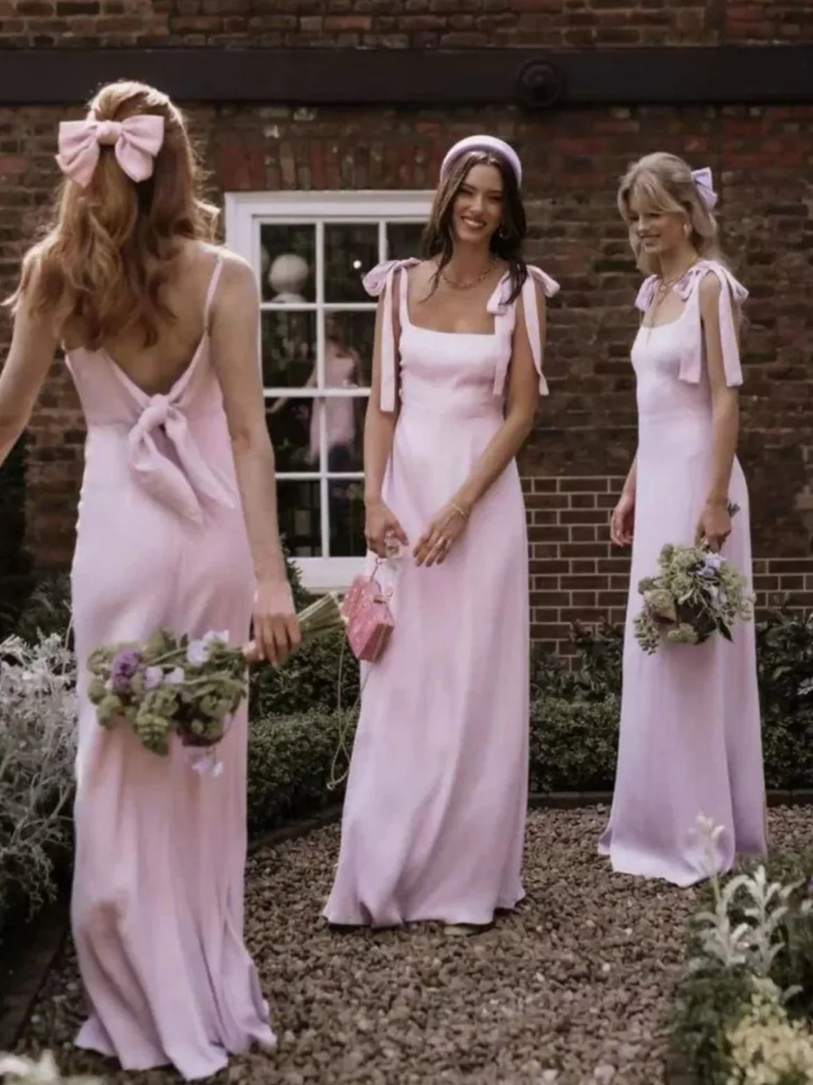 Pink satin floor-length A-line dress with open back and bow-tie straps