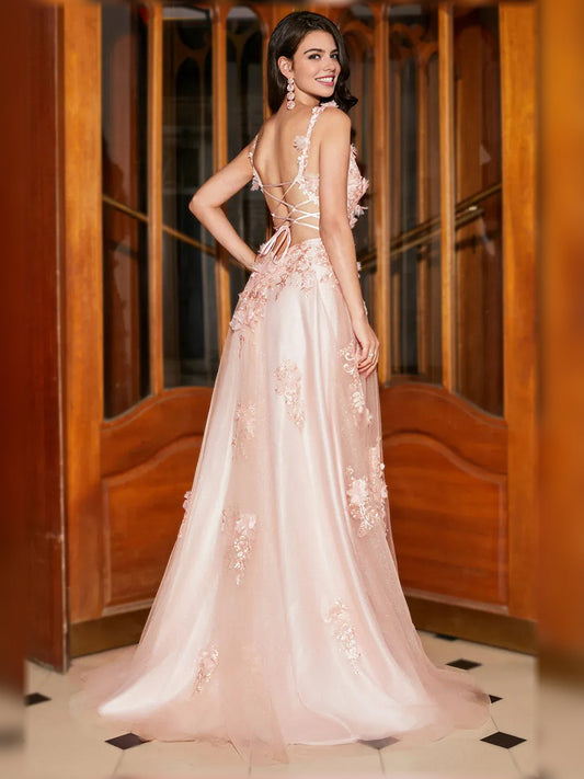 Light pink floral formal gown with V-back, sleeveless lace appliques, flowing A-line skirt