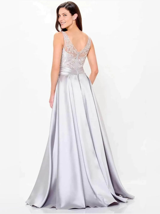 Silver floor-length formal dress with lace V-back and flowing pleated skirt