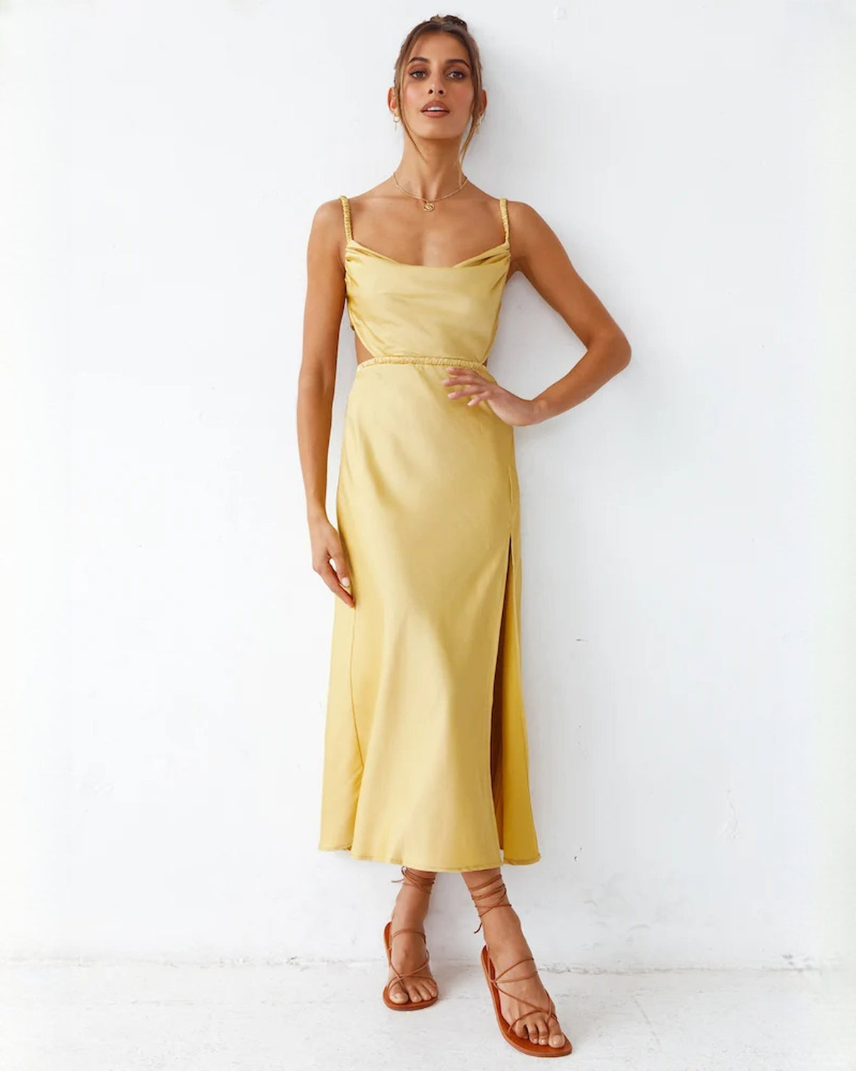 Yellow satin sleeveless A-line maxi dress with square neckline and front slit