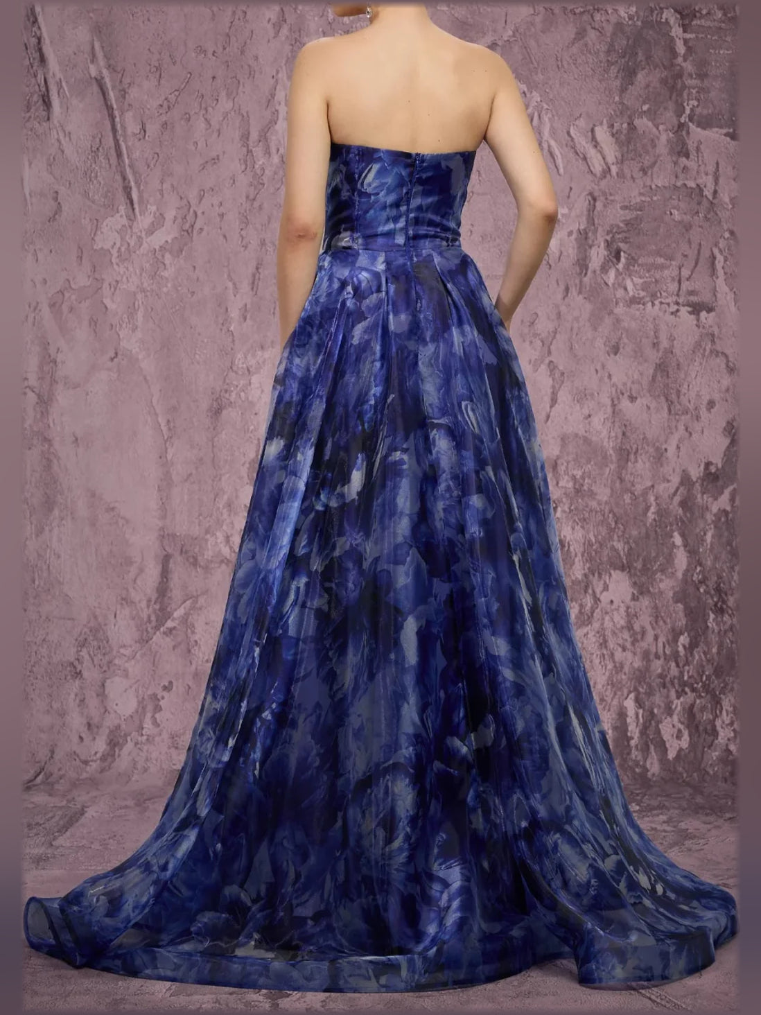 Navy strapless floor-length gown with fitted bodice and swirled pattern full skirt