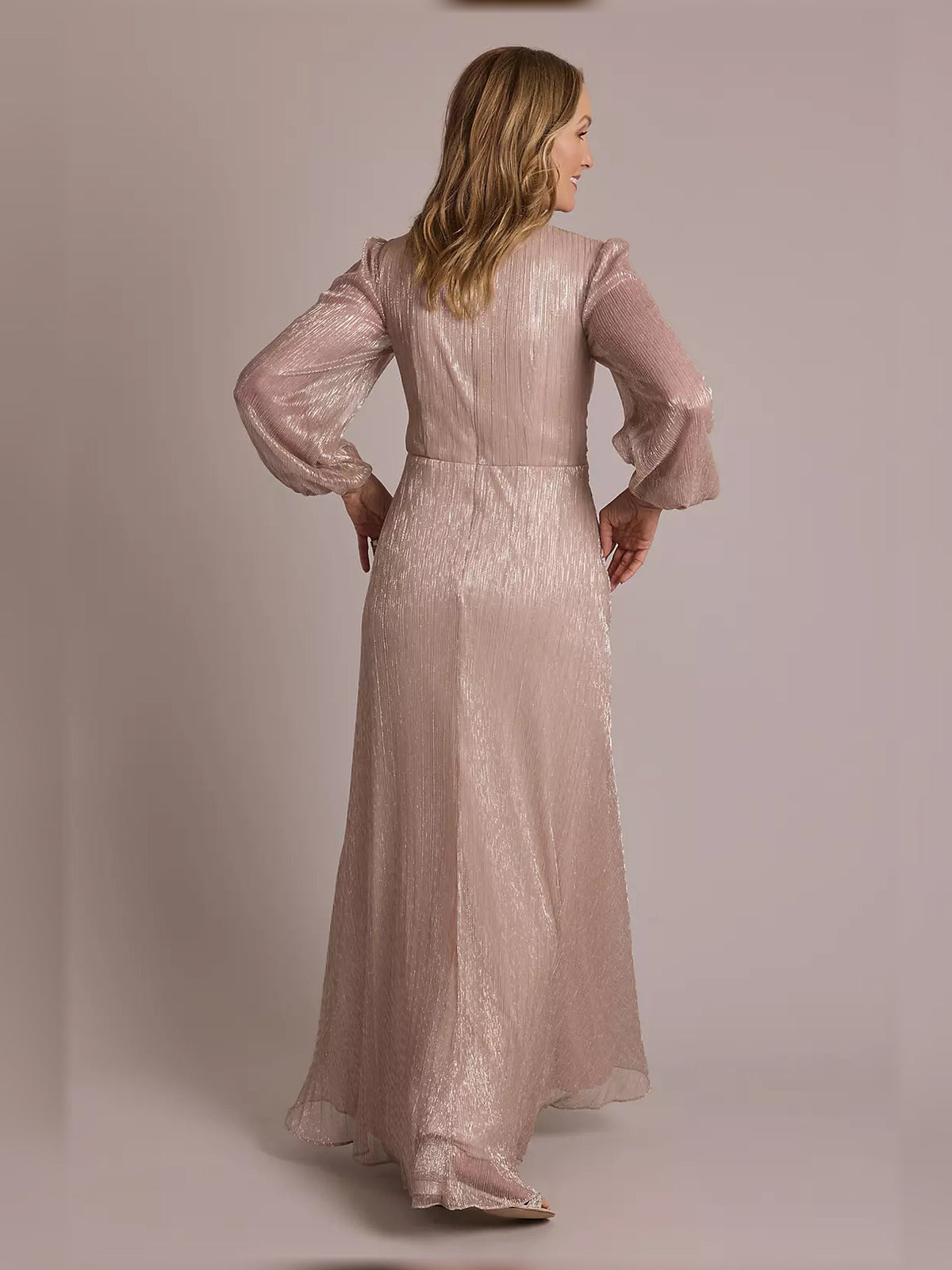 Rose gold wrap waist floor-length dress with long sheer sleeves, back view