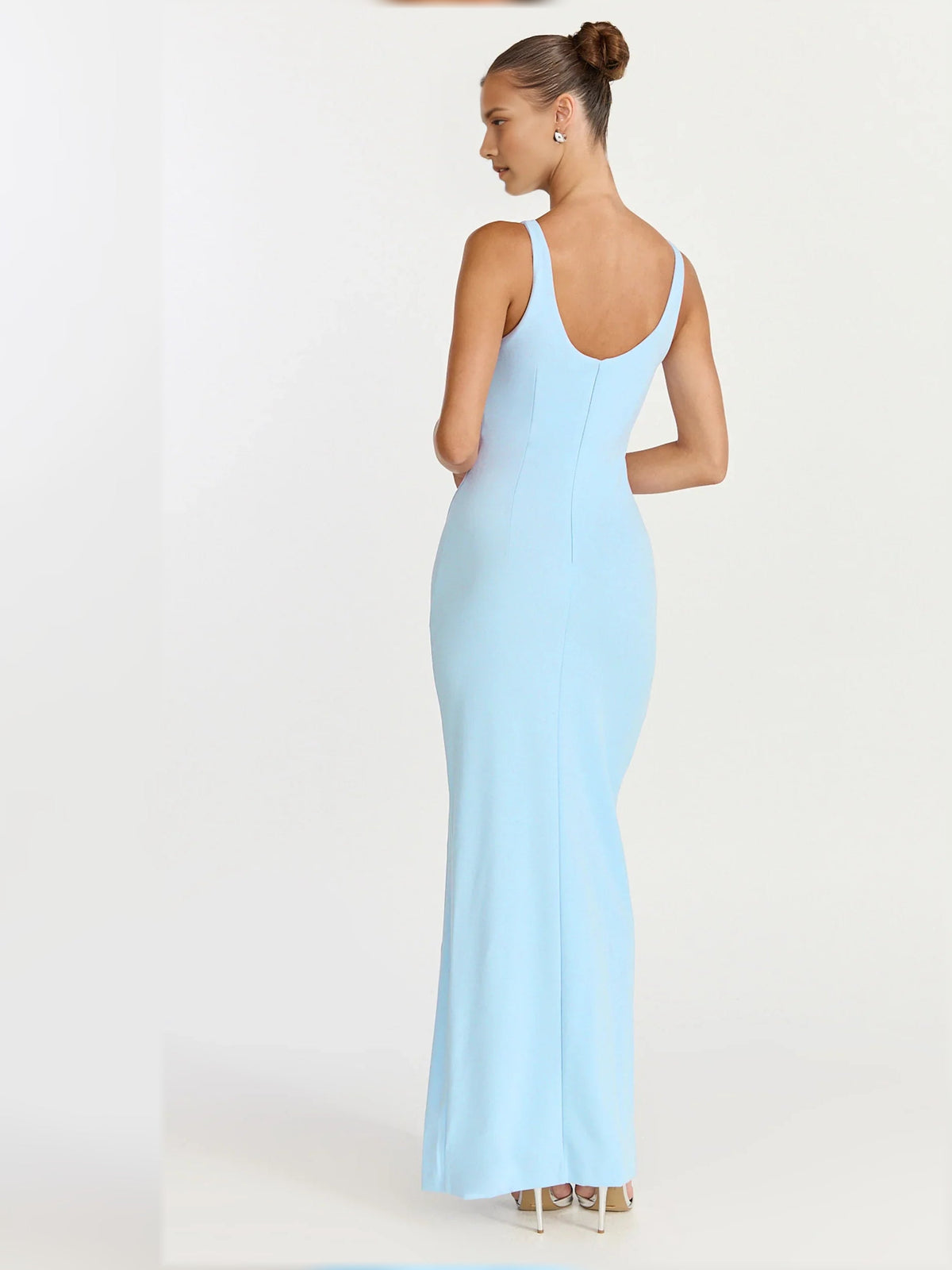 Light blue open-back sleeveless sheath formal dress with front slit, floor-length