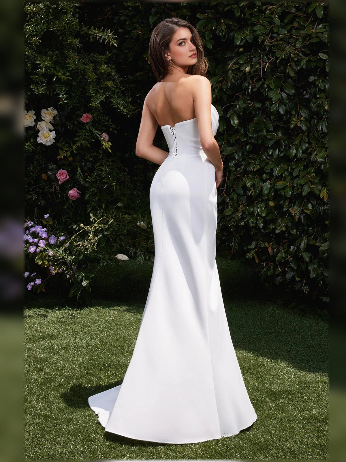 White strapless cowl mermaid formal dress with strappy back and long hem