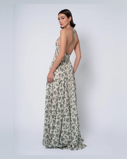 Back view: sleeveless A-line maxi dress with V-back and dark green floral print