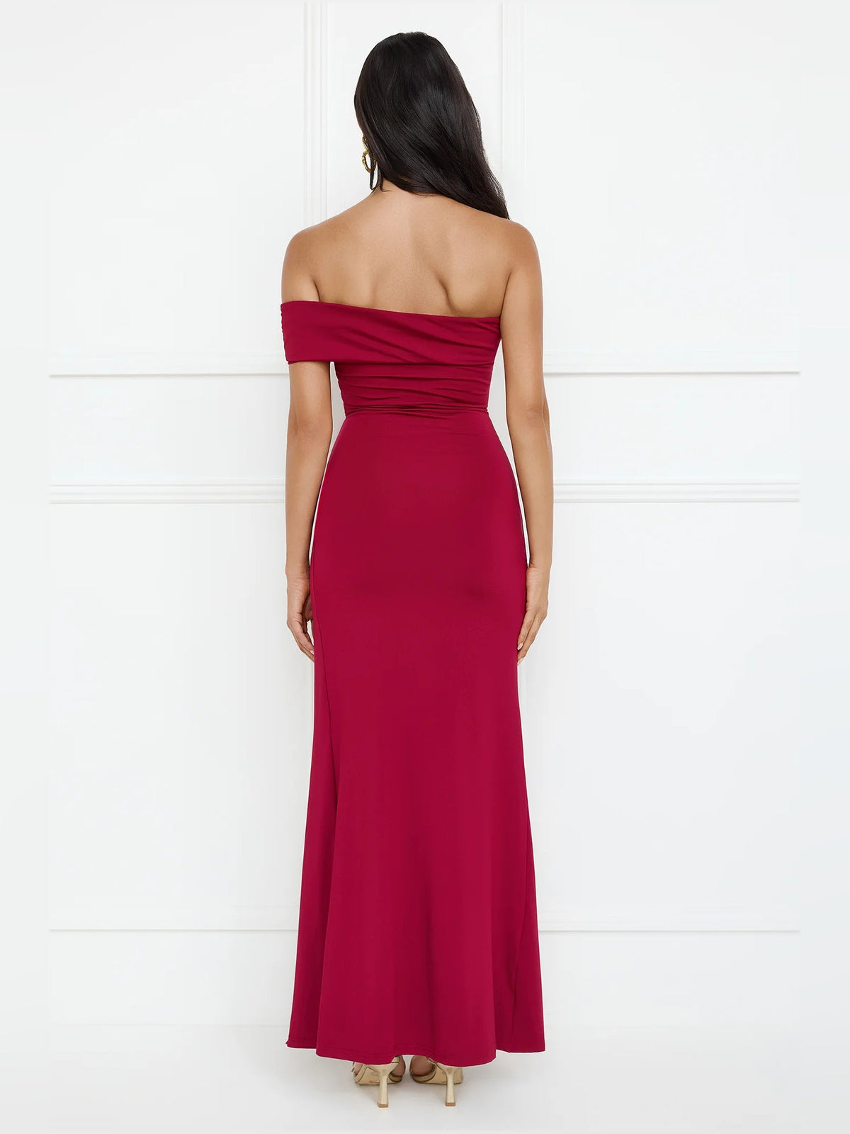 Burgundy sheath maxi formal dress with skirt slit, full-length back view