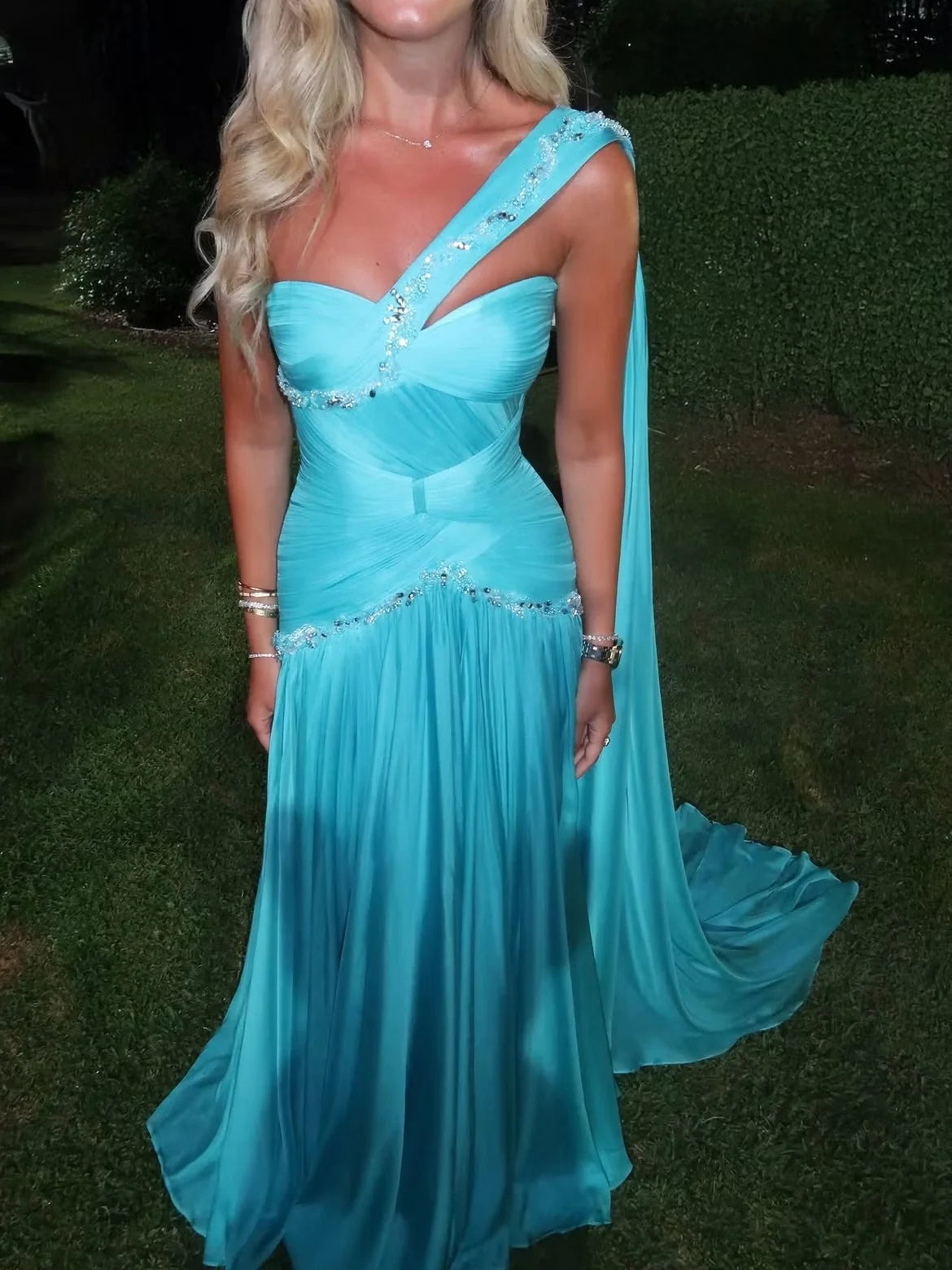Aqua sweetheart A-line prom dress with pleated skirt, beaded bodice, draped side strap