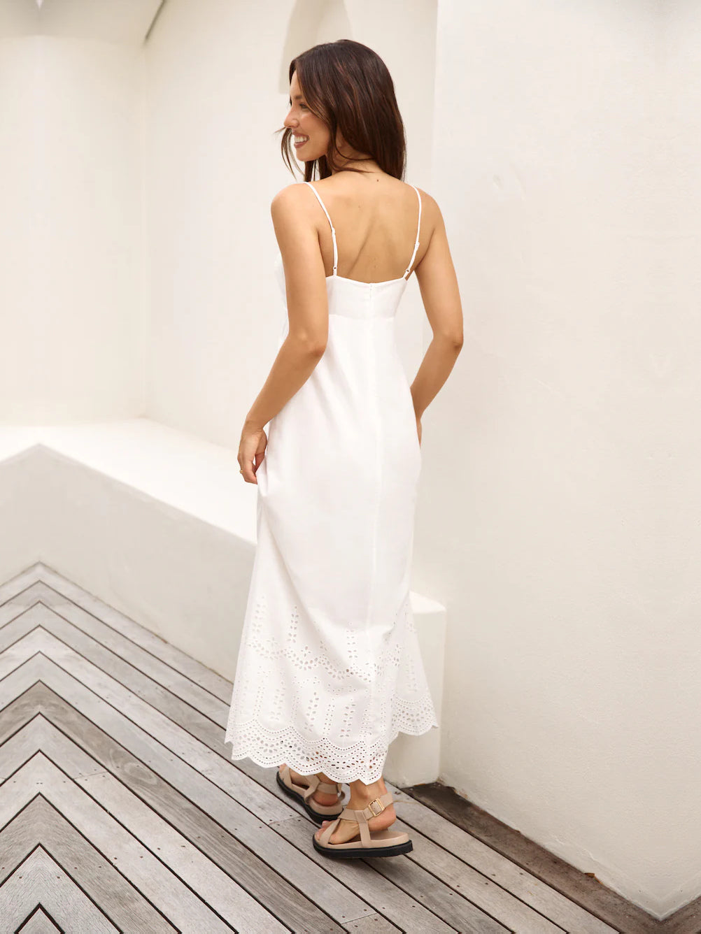 White a-line maxi formal dress with a-line, full-length back view