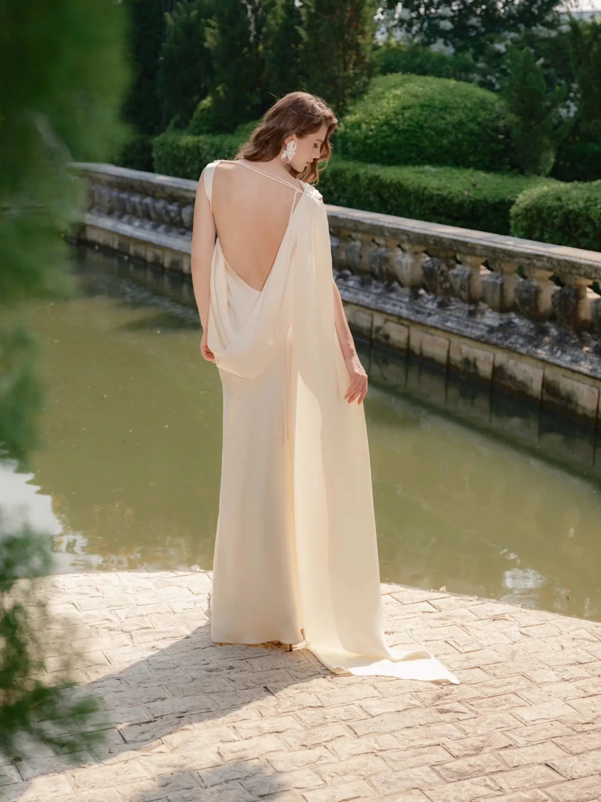 Ivory satin floor-length sheath wedding dress viewed from back