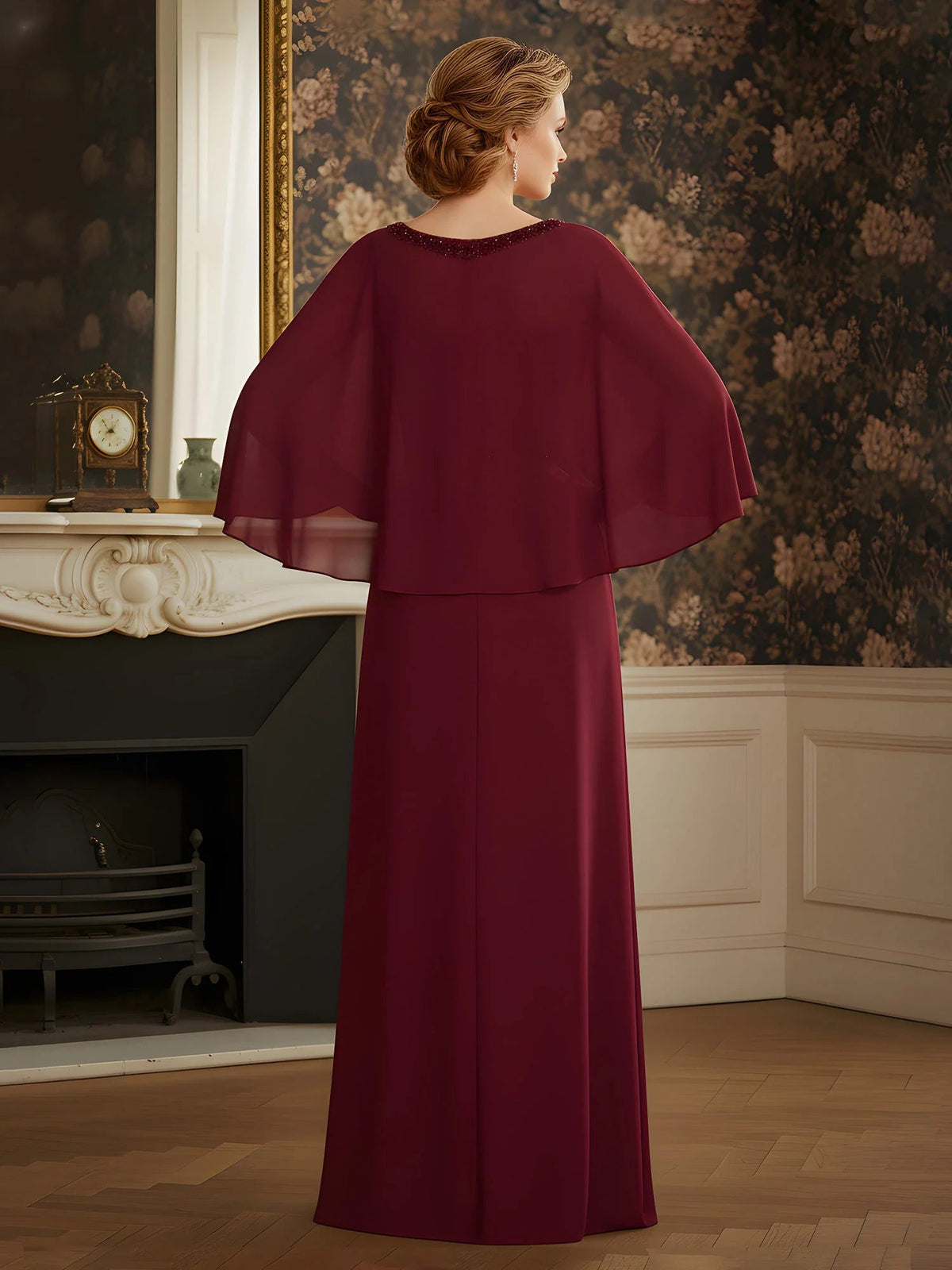 Burgundy column maxi dress with flowing chiffon back cape overlay and beaded neckline