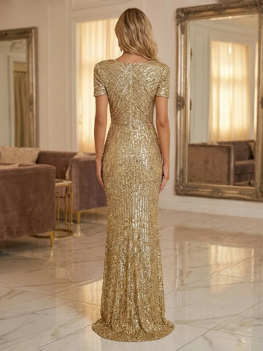 Gold sequin mermaid prom dress, back view, boat neckline, short sleeves, floor-length