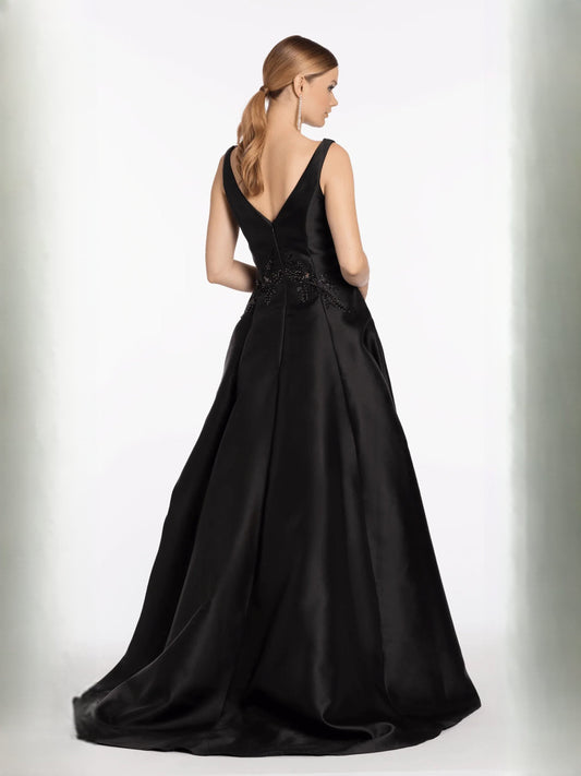 Black V-neck sleeveless formal dress with beaded waist detail and full A-line skirt