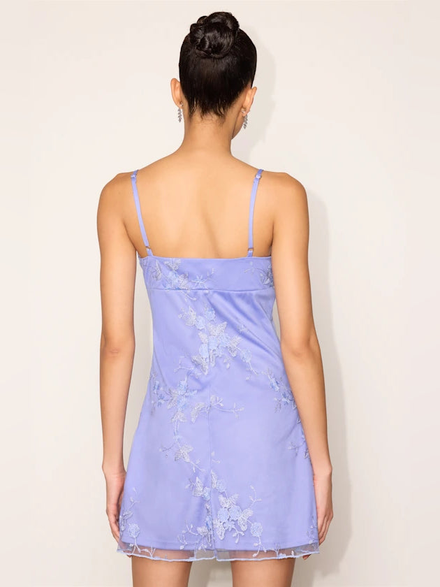Lavender embroidered sleeveless mini dress, back view with thin spaghetti straps