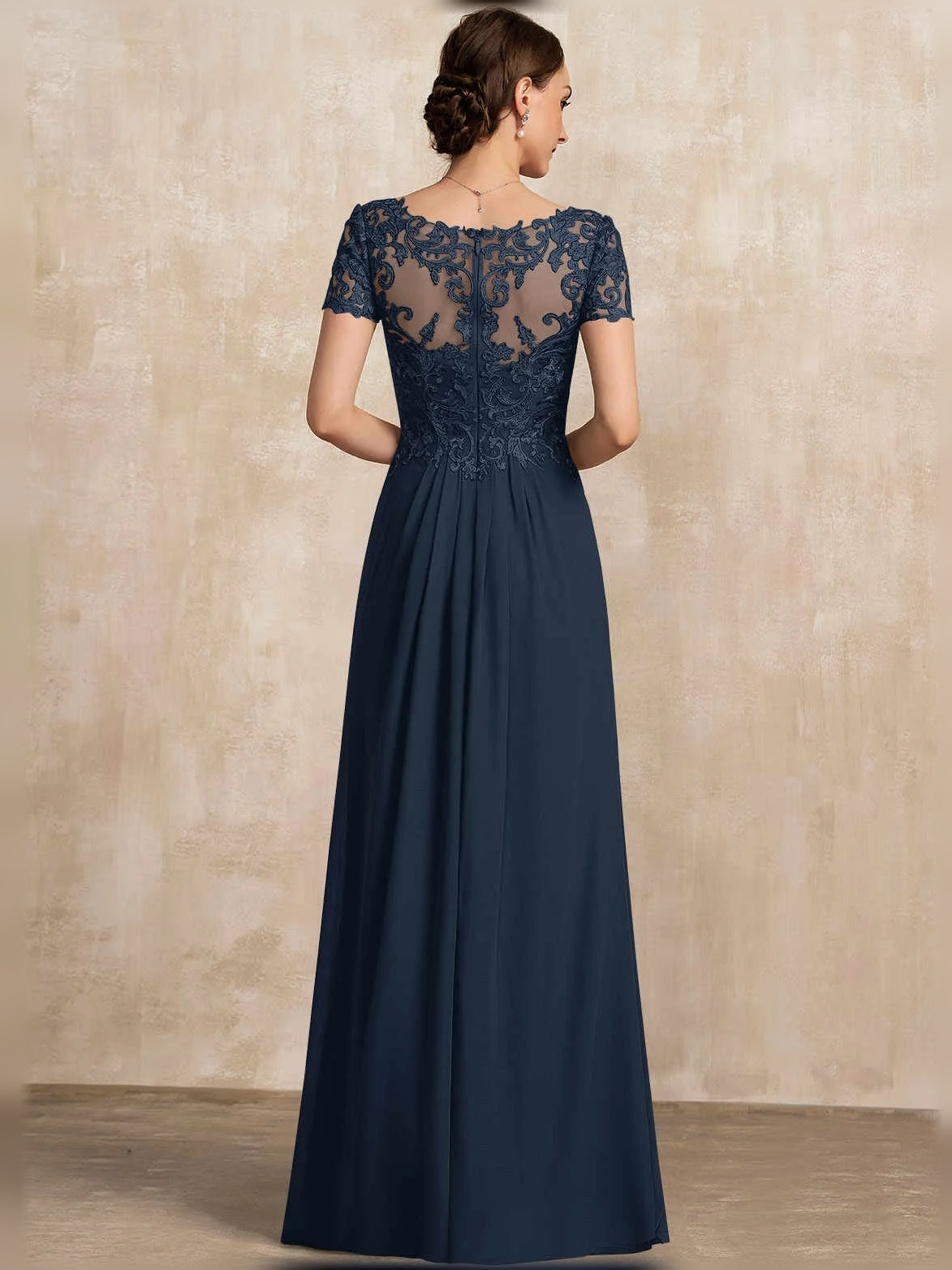 Dark blue back view of V-neck chiffon A-line mother-of-the-bride dress with lace bodice