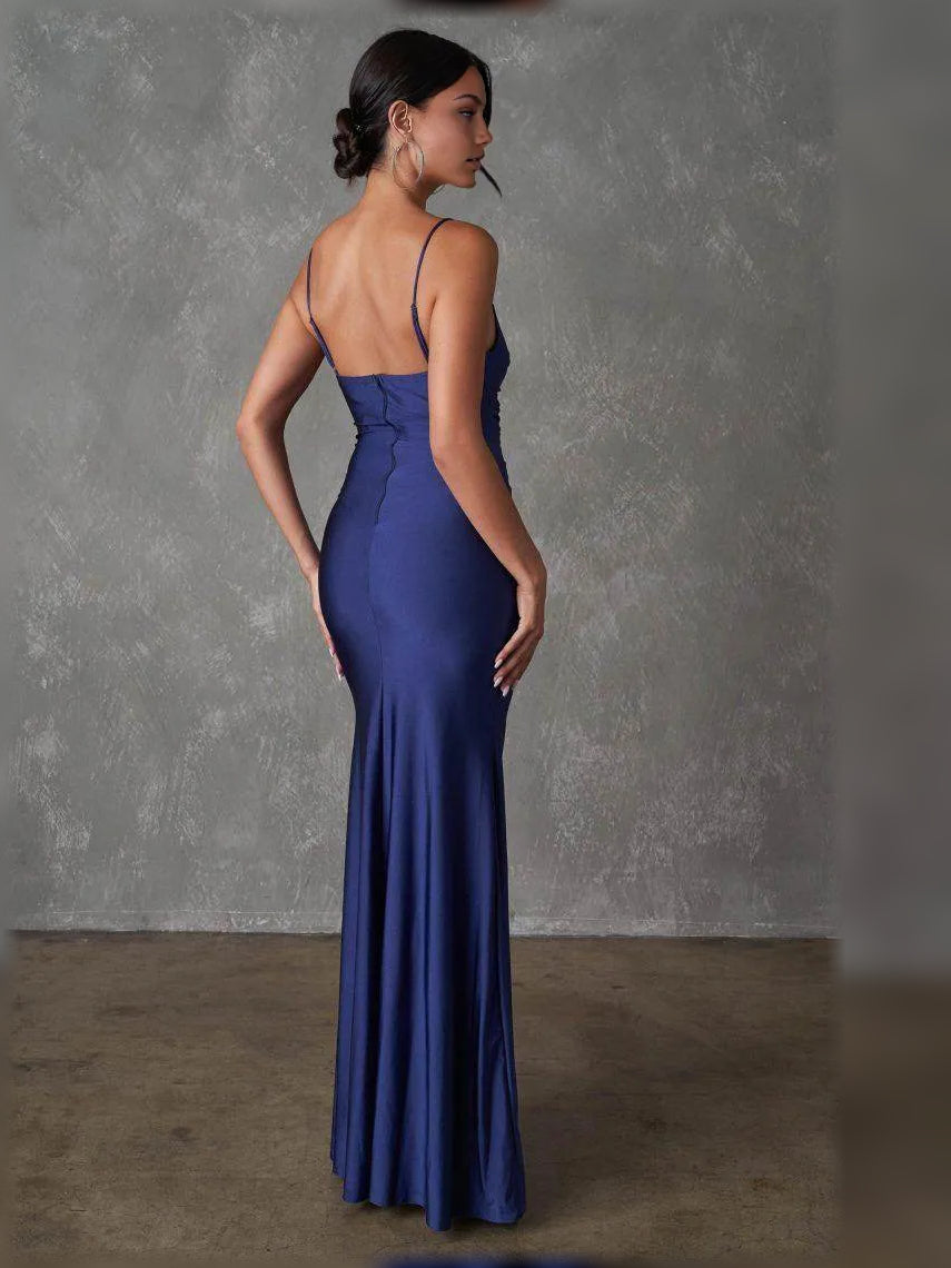Navy blue ruched V-neck spaghetti-strap maxi dress with front slit, side view