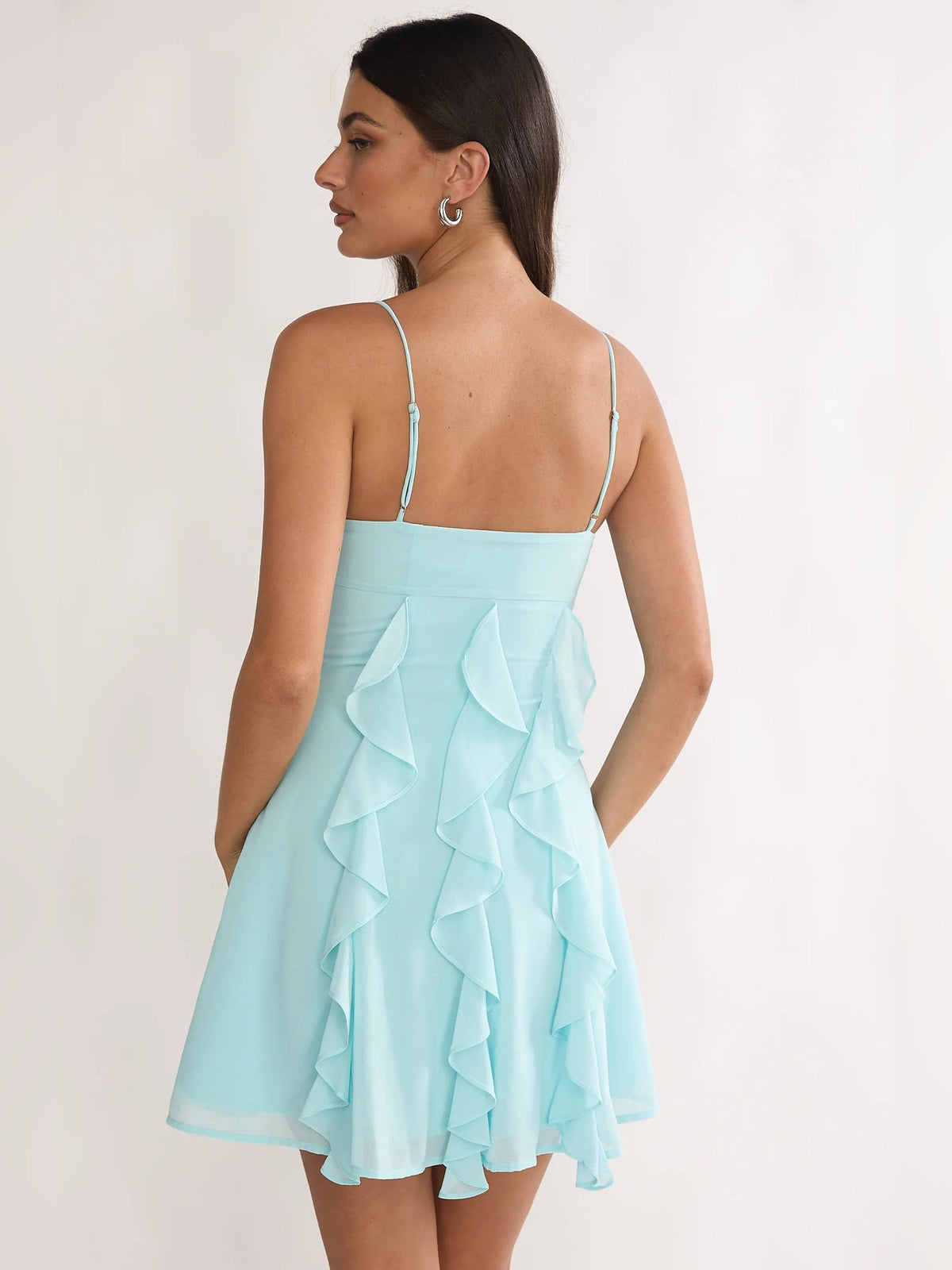 Aqua ruffled mini dress with thin spaghetti straps, open back, layered ruffle tiers