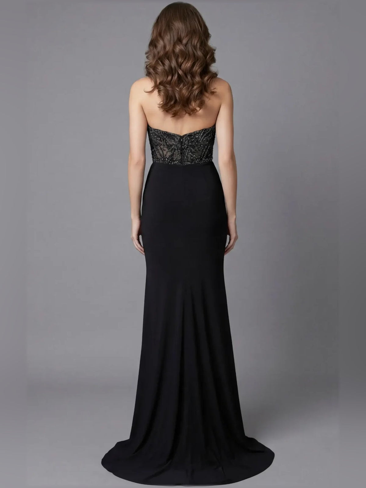 Black sweetheart corset evening gown from back view, lace bodice and ruched waist