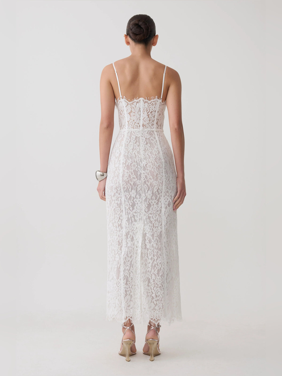 White lace midi formal dress from back view with openwork mesh straps
