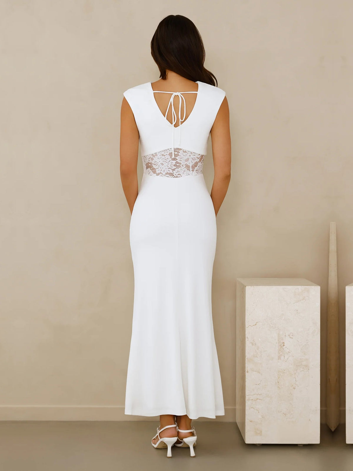 White sheath maxi formal dress with sheath, full-length back view