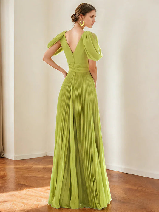 Olive green V-neck formal dress with puff sleeves, fitted waist, and pleated floor-length skirt